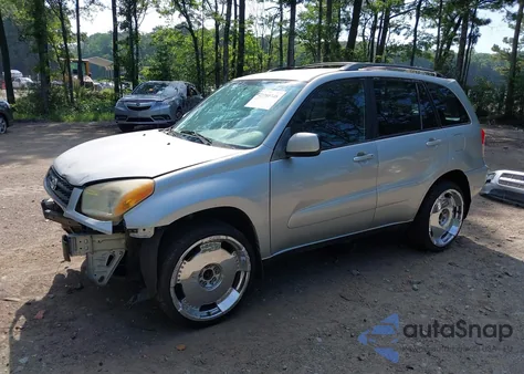 2003 Toyota Rav4 из США, поврежденный, VIN JTEGH20V130105225